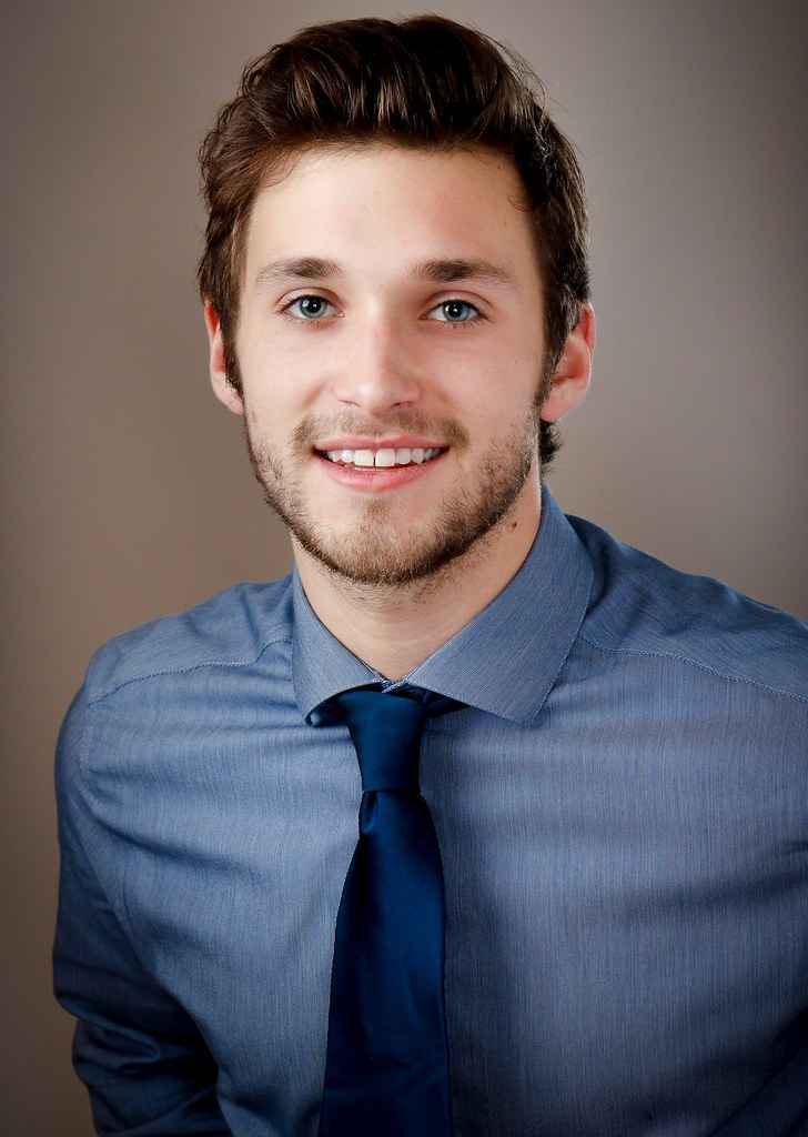 Professional studio portrait for an about page profile